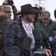 Ammon Bundy (center) addresses the media in Oregon.
CBS News screenshot